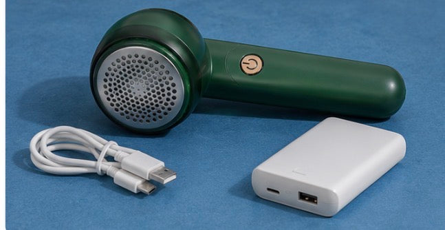 Rechargeable fabric lint remover for removing lint and fuzz from clothes.